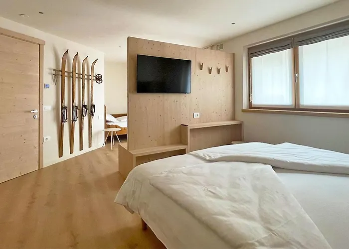 Alpine Rooms&Suites Livigno - Camana Noa -